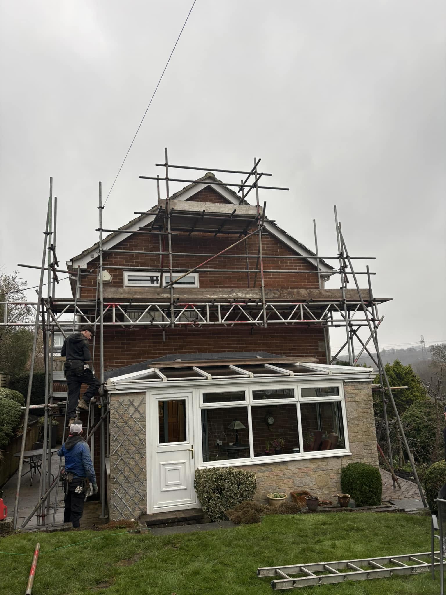 Scaffold built around a domestic conservatory in Leeds